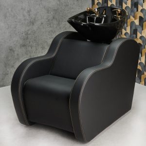 Moderner Friseurstuhl mit integriertem Waschbecken, ideal für Salons und stilvolle Haarpflegeeinrichtungen.