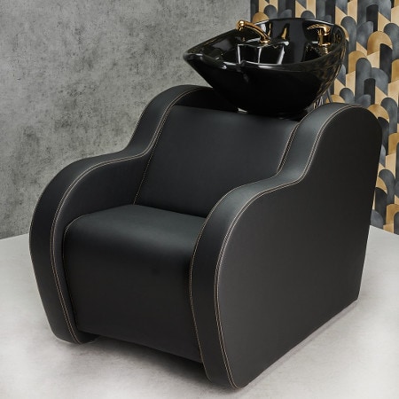 Moderner Friseurstuhl mit integriertem Waschbecken, ideal für Salons und stilvolle Haarpflegeeinrichtungen.